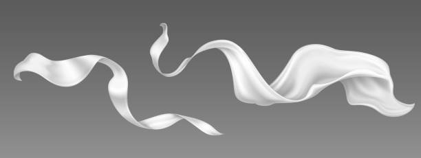 Flying white silk ribbon and satin fabric Flying white silk ribbon and satin fabric. Vector realistic set of billowing velvet clothes, scarf or cape in blowing wind. Luxury white textile drapery, flowing tissue isolated on grey background Silk stock illustrations