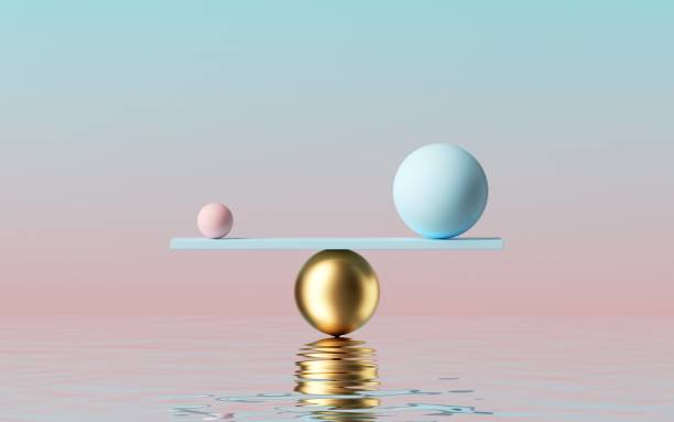 istock 3d render, balls placed on scales with reflection in the water, isolated on pastel pink blue background. Primitive geometric shapes. Balance and comparison metaphor. Modern minimal design 1279852276