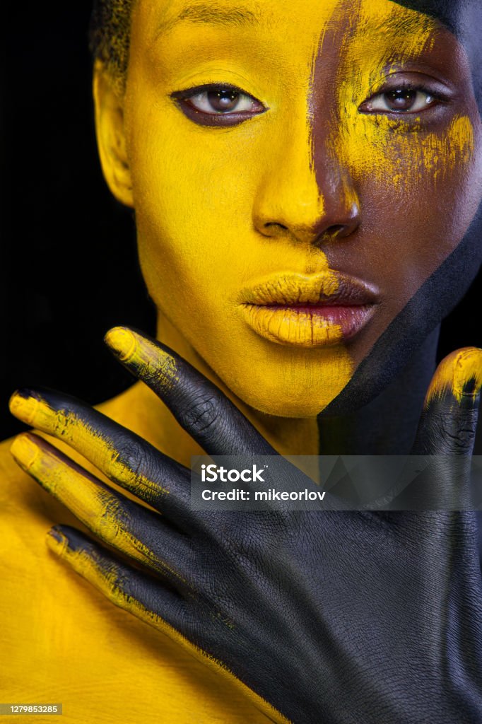 Face Art Woman With Black And Yellow Body Paint Young African Girl With Face Art Woman With Black And Yellow Body Paint Young African Girl With