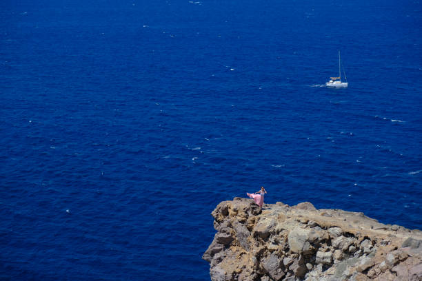 Regatta sailboat and catamaran in sea of Santorini on August 18, 2020 Santorini, Greece.