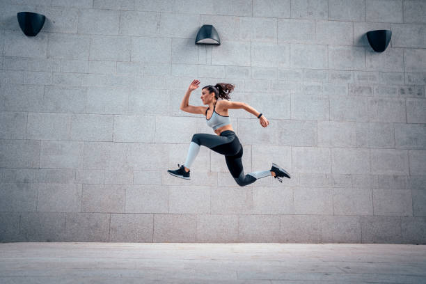 istock Woman athlete jumping during exercising 1279853531