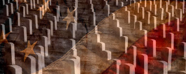 arlington cemetery and grave stones of fallen soldiers with faded flag - arlington virginia arlington national cemetery veteran cemetery imagens e fotografias de stock