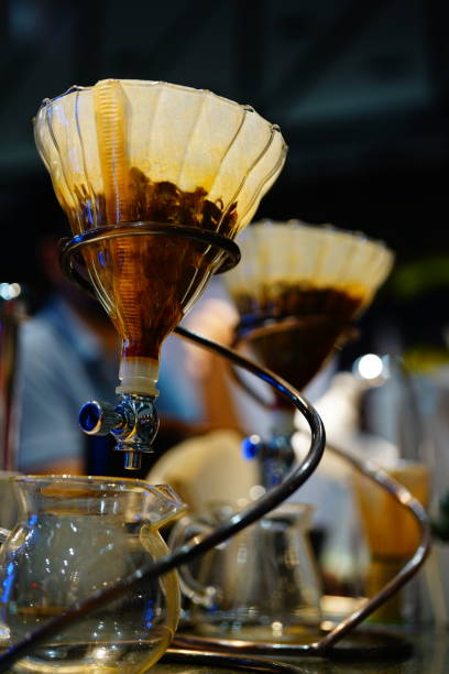 istock Drip coffee a roll of pot of coffee with vintage filter 1279854529