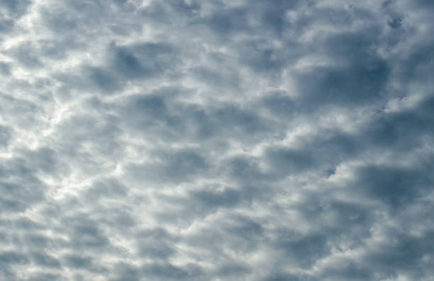 istock A pattern of blue clouds with touches of white in the sky. 1279854730