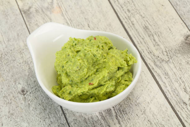 istock Avocado guacamole sauce with chili pepper 1279855424