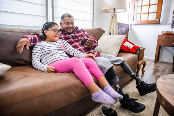 Disabled Father playing with Daughter at home A father with disabilities playing with his daughter fat mexican man pictures stock pictures, royalty-free photos & images