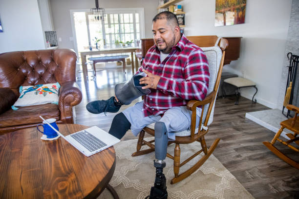 istock Hispanic Veteran Amputee Telemedicine Call with Doctors 1279856656