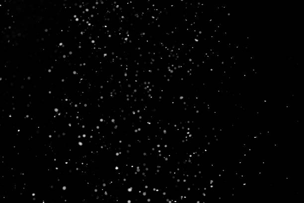 istock Falling white snow on the black background, snowflakes to overlay 1279857257