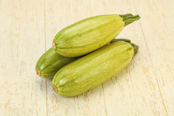 istock Young tasty zucchini over board 1279857440