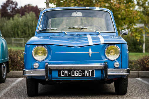 Mulhouse - France - 11 October 2020 - Front view of blue Renault 8 parked in the street
