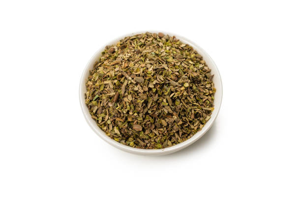 istock Oregano in a bowl isolated. 1279861635