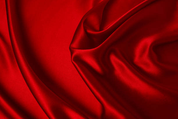 istock Red silk or satin luxury fabric texture can use as abstract background. Top view. 1279861722