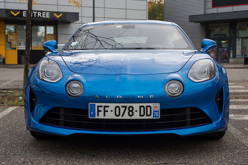Mulhouse - France - 11 October 2020 - Front view of blue Alpine a 110 parked in the street