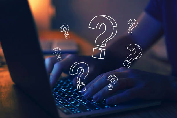 istock many quiestion marks on computer, find answer online, FAQ 1279863194