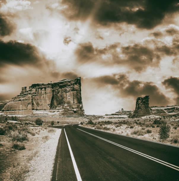 istock Road across Arches National Park at sunset, Utah 1279863988