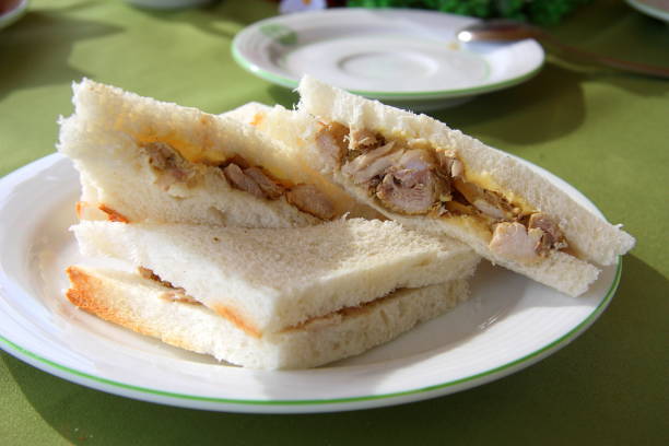 istock Chicken sandwich. Plain pieces of bread with boiled chicken. 1279865164
