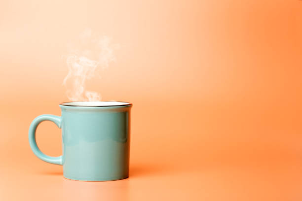 istock Cup minimal concept. Cup with hot coffee or tea on a blank colored background. 1279867933