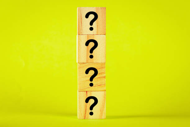istock ? Questions Mark word in wooden cube block 1279869190