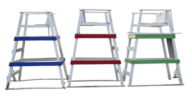 istock weathered blue, red and green lifeguard towers 1279869441