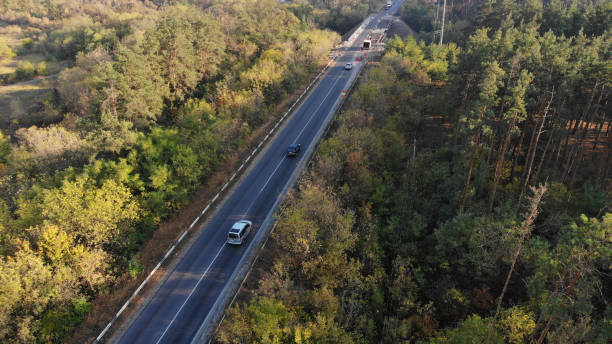 istock Aerial. Traffic motion on a country highway. Top view. 1279874966