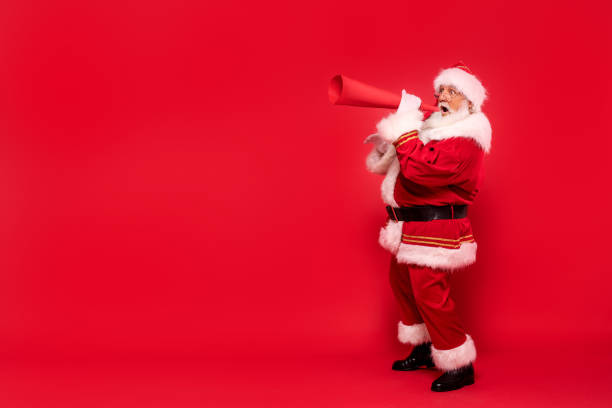 istock Santa Claus screaming through megaphone 1279875974