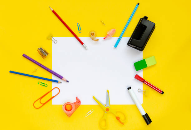 istock School and office supplies on yellow background 1279877216
