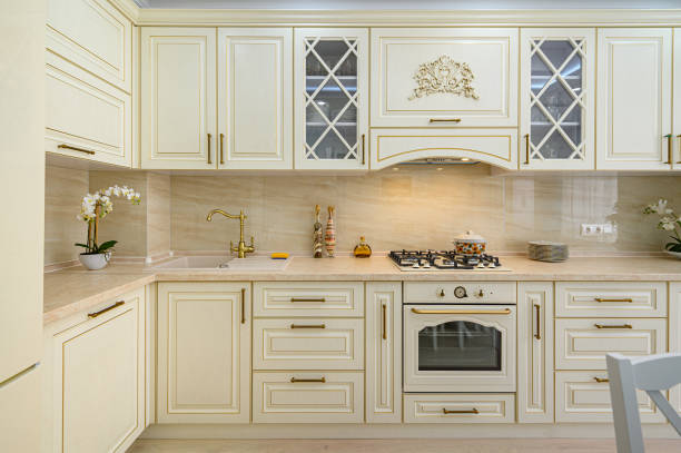 istock Beige furniture at kitchen in provence style, front view 1279879016