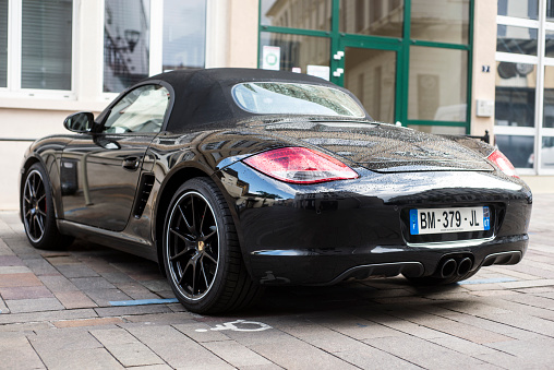 Mulhouse - France - 28 June 2020 - rear view of black Porsche 718 boxster parked in the street