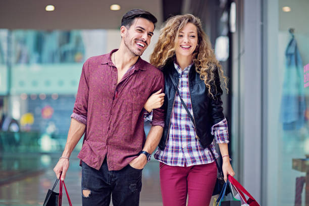 istock Shopping couple is walking in the Mall 1279881652