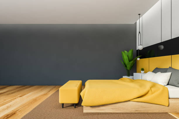 istock Yellow and gray master bedroom, side view 1279881708