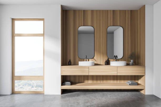 istock Modern white and wooden bathroom with double sink 1279881762