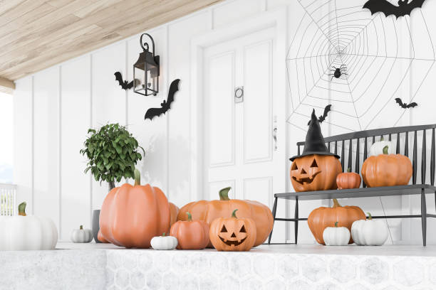 istock Carved pumpkins on white house stairs, side view 1279882768