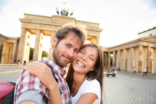 istock Happy couple selfie, Brandenburg Gate, Berlin 1279893961