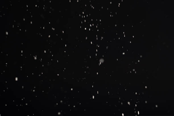 istock dust background blur flying white ash flakes black 1279895697
