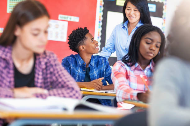 istock Japanese professor explaining to male Black ethnicity student in school 1279903389