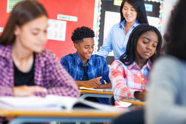 istock Japanese professor explaining to male Black ethnicity student in school 1279903398