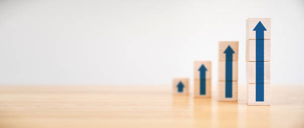 istock Ladder career path for business growth success process concept.Wood block stacking as step stair with arrow up. Panoramic image 1279904483