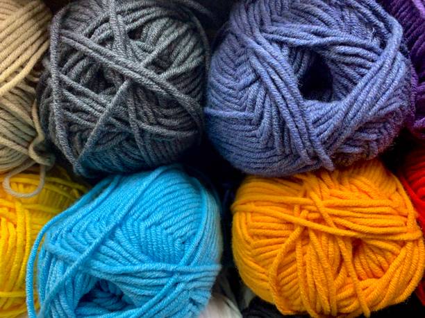 istock Background multi colored. Closeup of a tangle of knitting threads. 1279906241