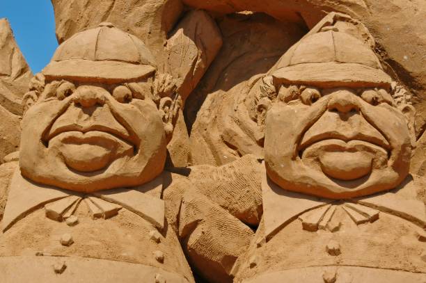 Frankston, Victoria / Australia - January 23, 2008: Two old men with caps as sand sculpture