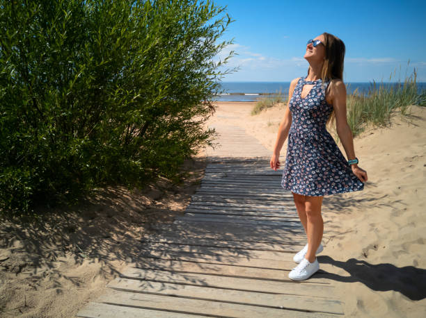 istock girl on the beach 1279920572