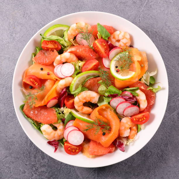 istock smoked salmon salad with shrimp, radish, tomato and grapefruit 1279921407
