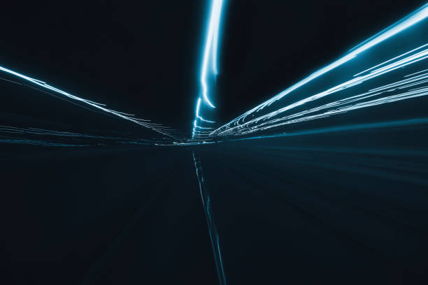 istock Abstract long exposure blurred city light trails 1279924983