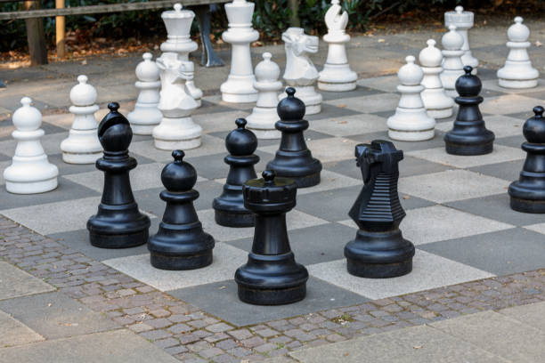 istock Chess board and pieces in park 1279927427