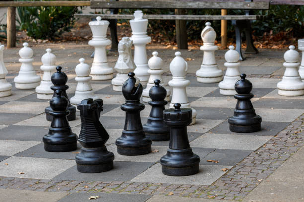 istock Chess board and pieces in park 1279927430