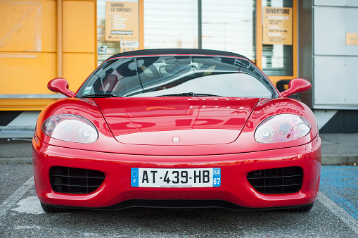 Mulhouse - France - 13 October 2019 - Front view of red Ferrari 360 Modena parked in the street