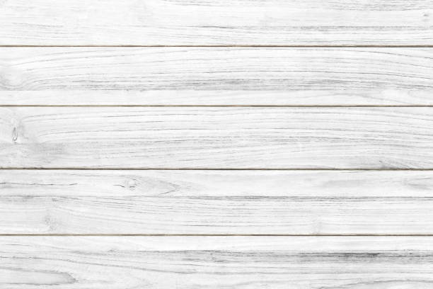 istock White grey wood color texture horizontal for background. Surface light clean of table top view. Natural patterns for design art work and interior or exterior. Grunge old white wood board wall pattern. 1279930511