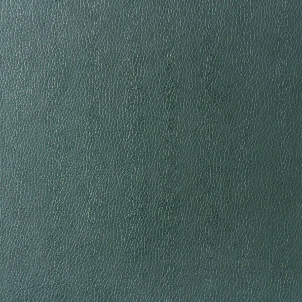 dunkelgrün rinder leder textur hintergrund - leather green hide textured effect stock-fotos und bilder