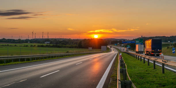istock highway in the light of the setting sun 1279934314