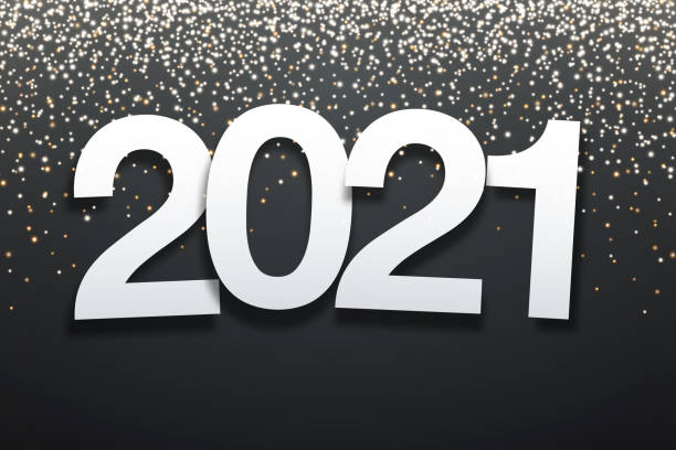 istock 2021 - Paper Font with gold glitter on Black Background 1279935582