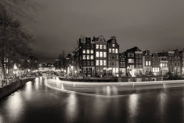 istock City canal with light trails at night in Amsterdam 1279940769